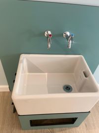 Child-height Belfast
        sink cleaned and ready for use