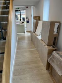 Corridor leading to
        reception after a builders clean
